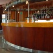 Banco bar con piano in resina e fibre ottiche in intrusione.